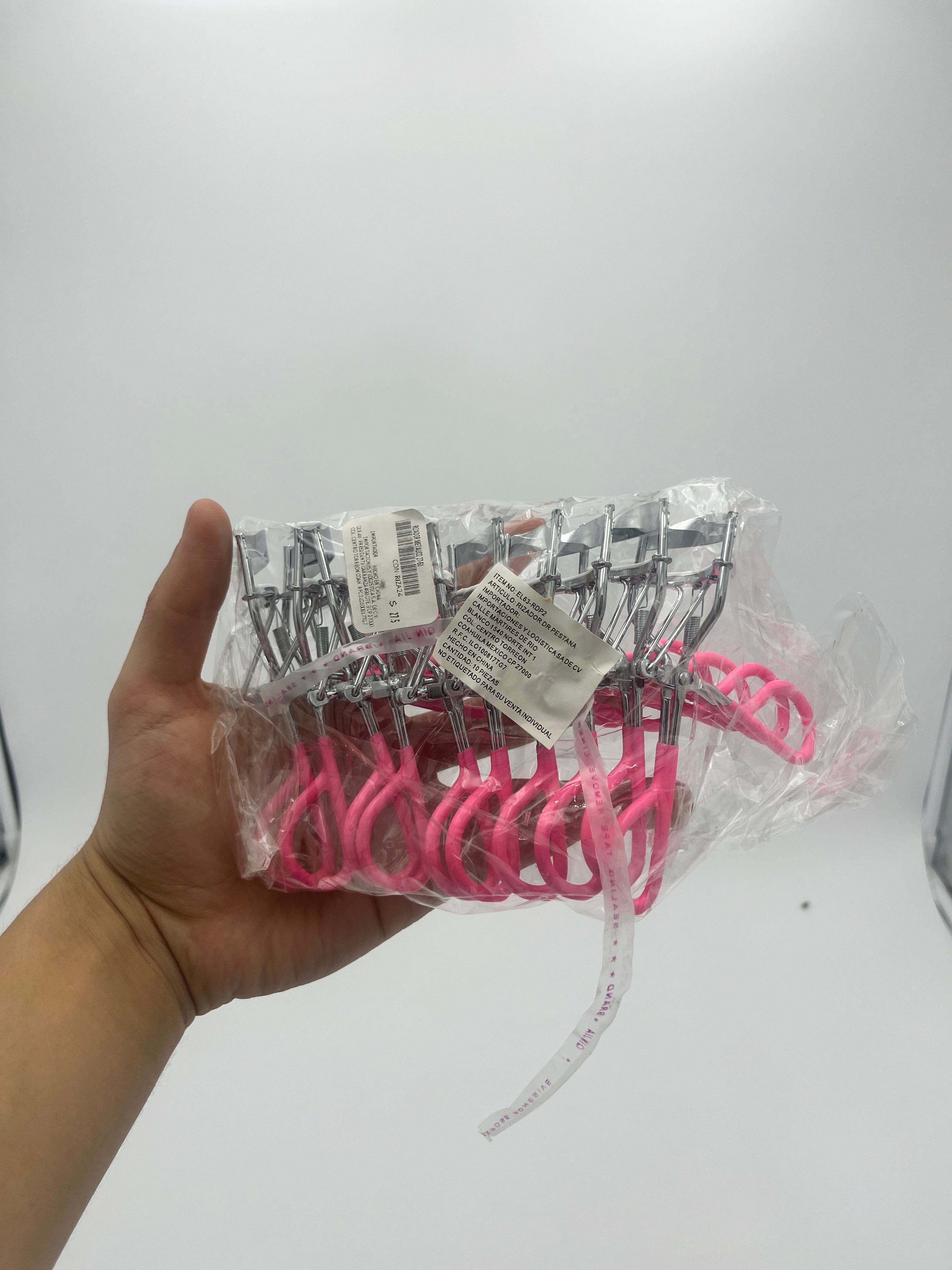 Rizador Metálico Rosa Con Resorte - Paquete de 10 piezas 8.40 c/u