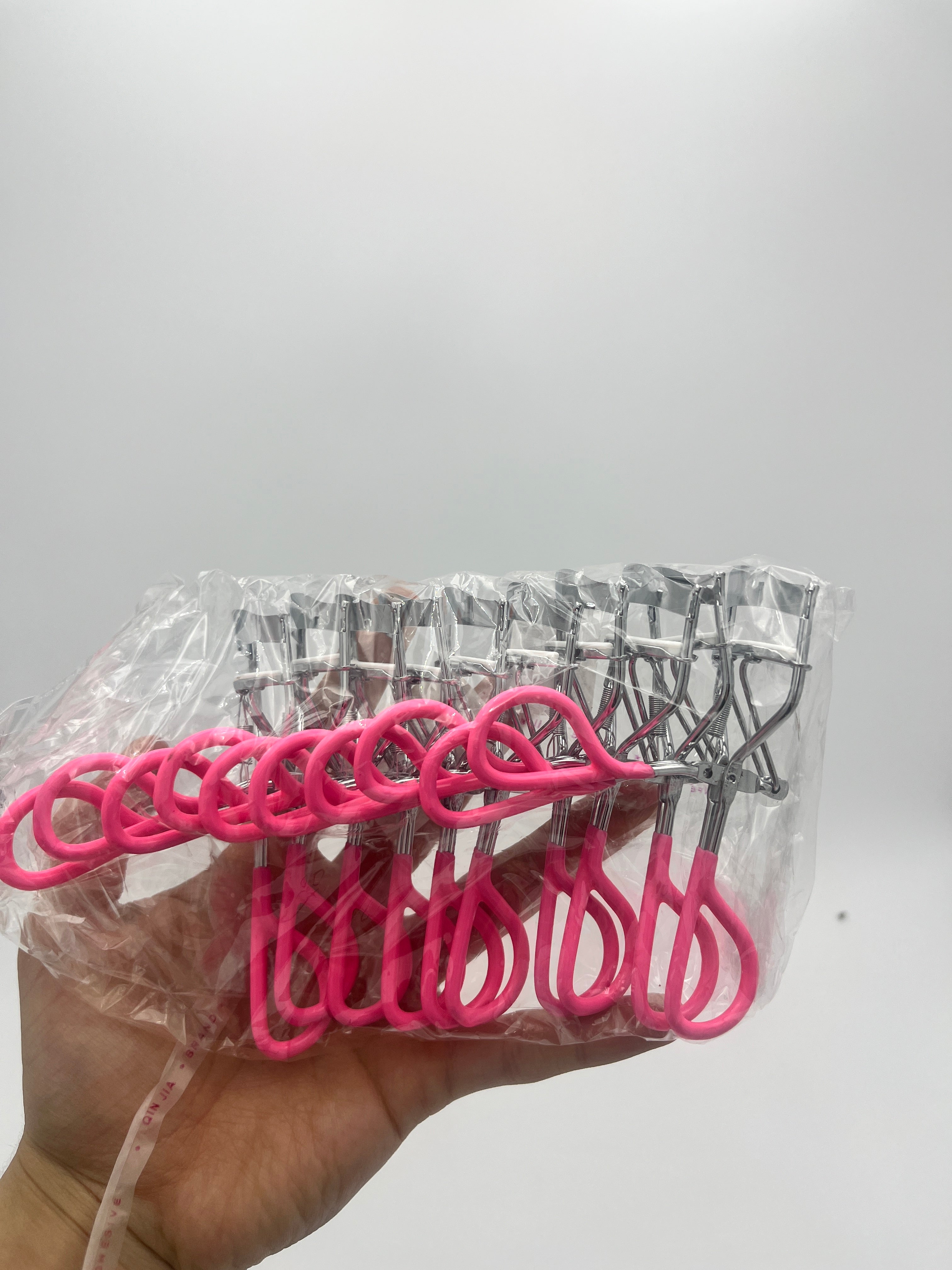 Rizador Metálico Rosa Con Resorte - Paquete de 10 piezas 8.40 c/u