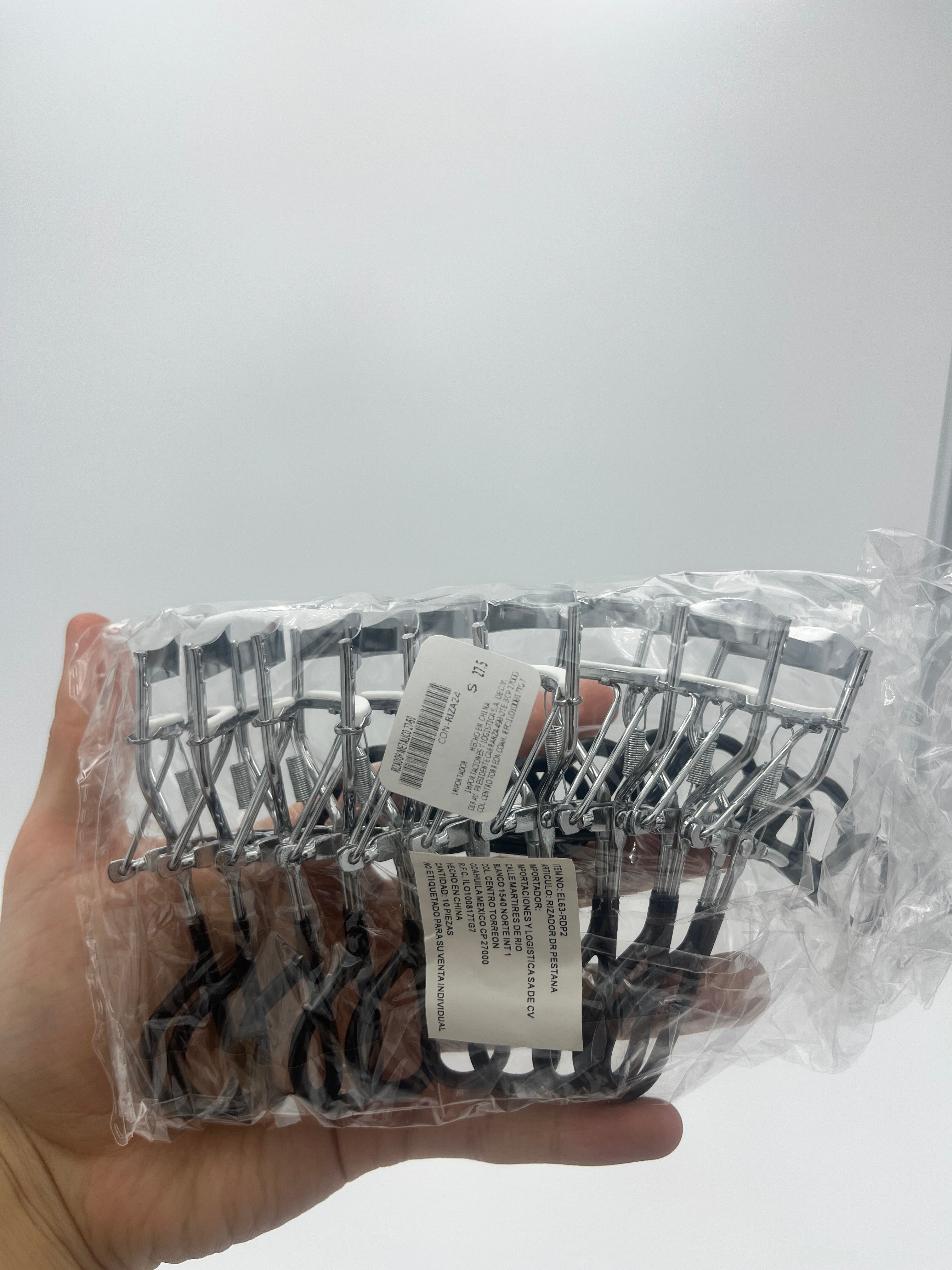 Rizador Metálico Negro Con Resorte - Paquete de 10 piezas 8.40 c/u