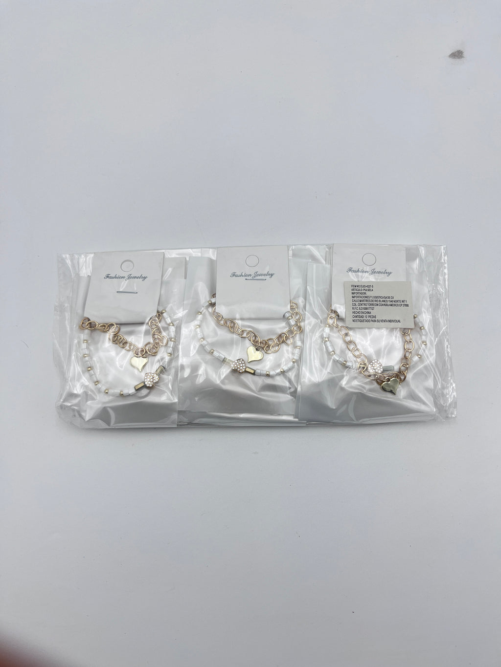 Pulsera con Cuentas y Cadena - Paquete de 12 piezas 14.08 c/u