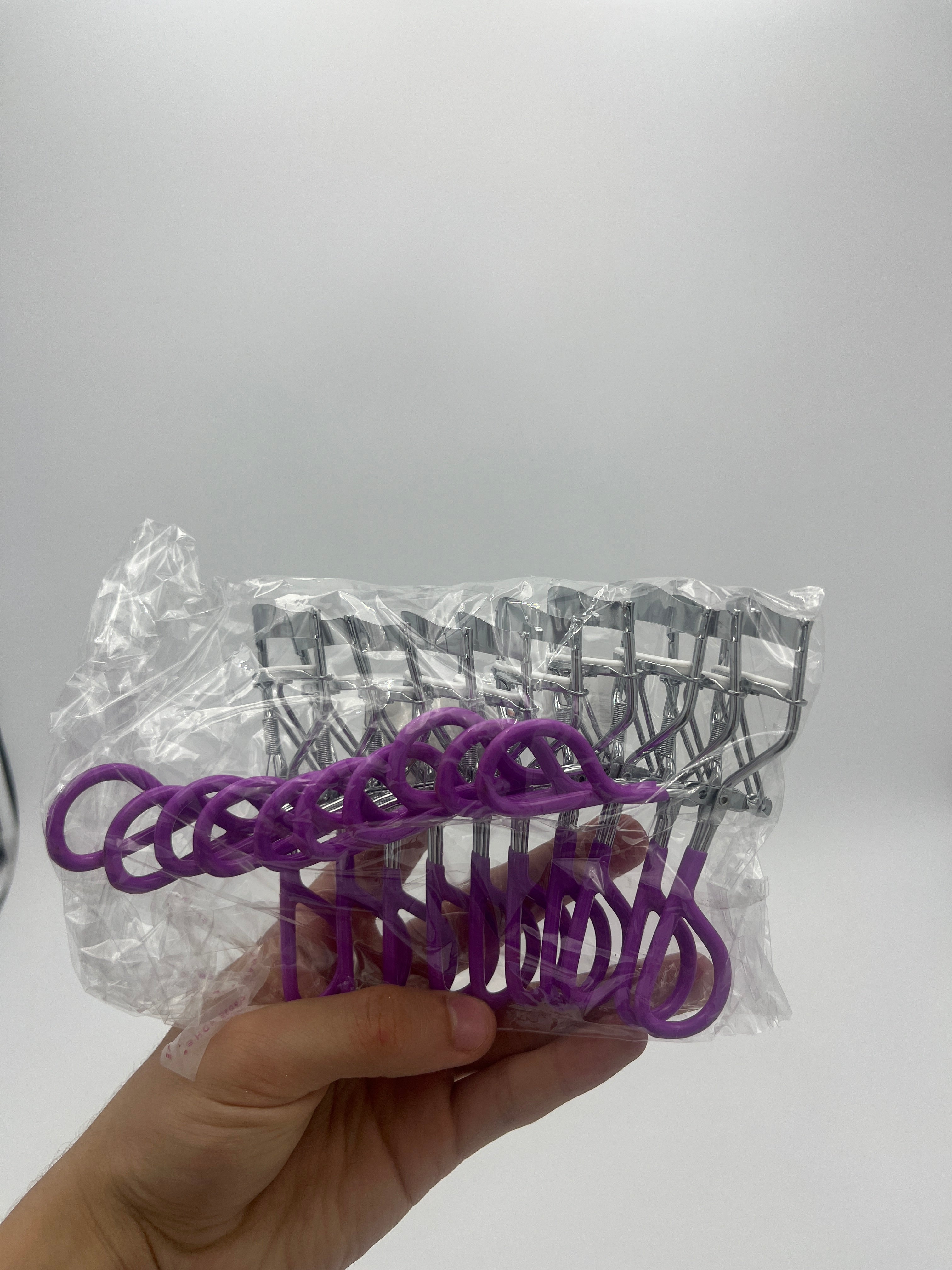 Rizador Metálico Morado Con Resorte - Paquete de 10 piezas 8.40 c/u