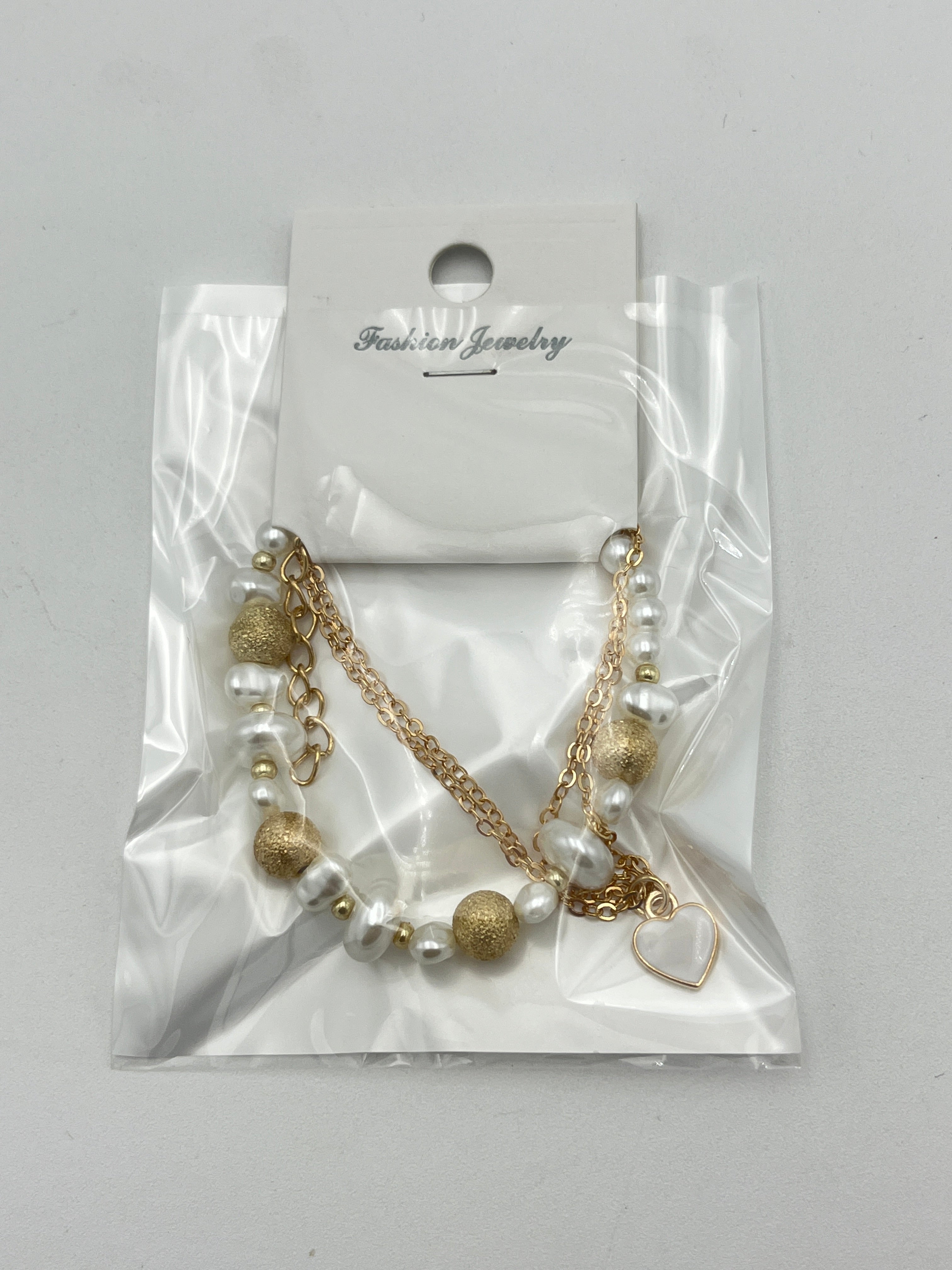 Pulsera Triple Cuentas y Corazon - Paquete de 12 piezas 14.08 c/u