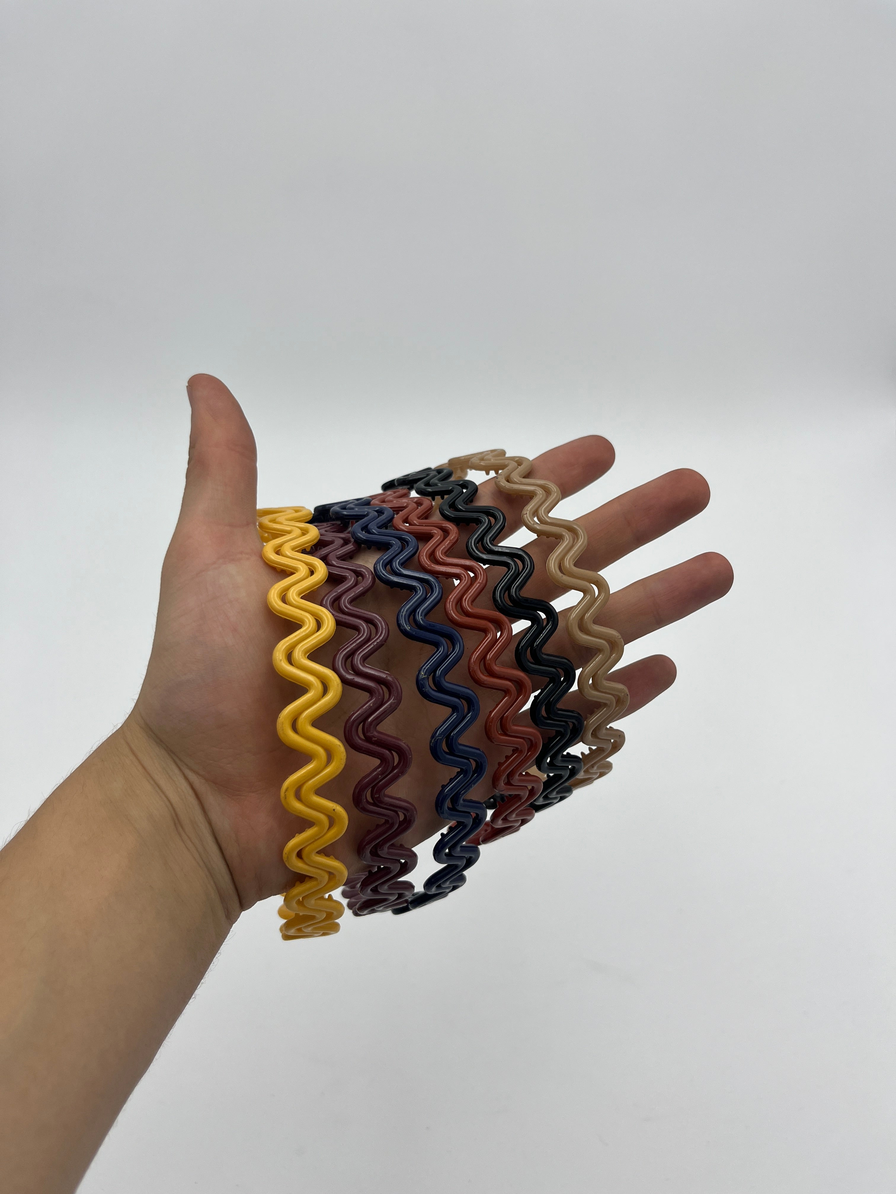 Diadema Onda Doble Colores Surtidos - Paquete de 12 piezas 1.83 c/u