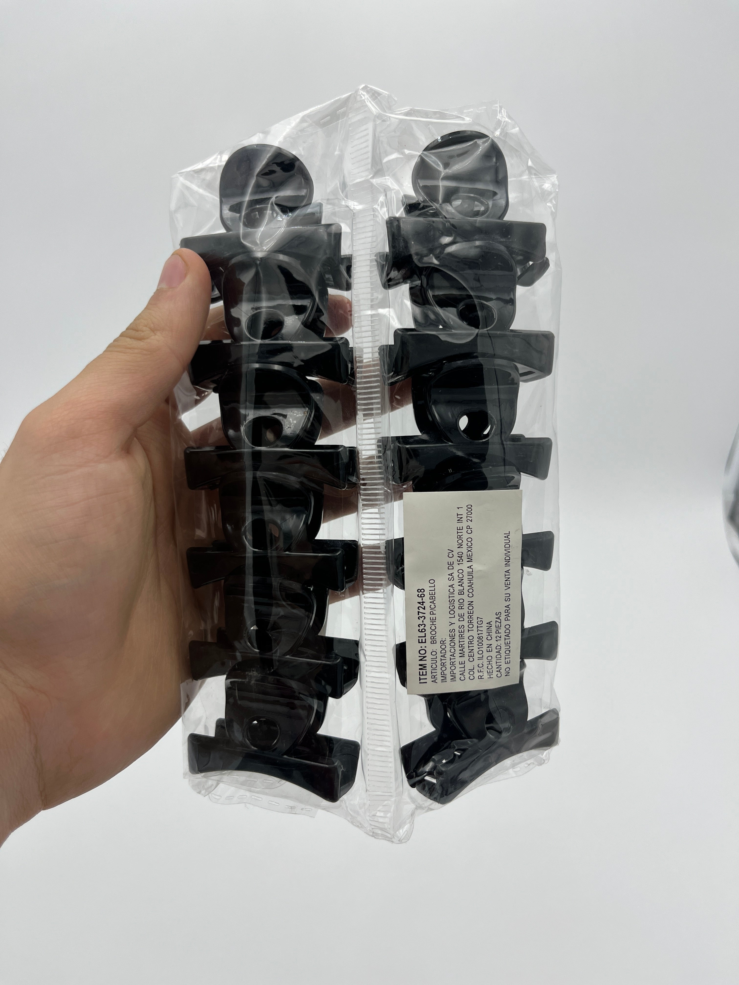 Pinza Chica negra - Paquete de 12 piezas 2.58 c/u