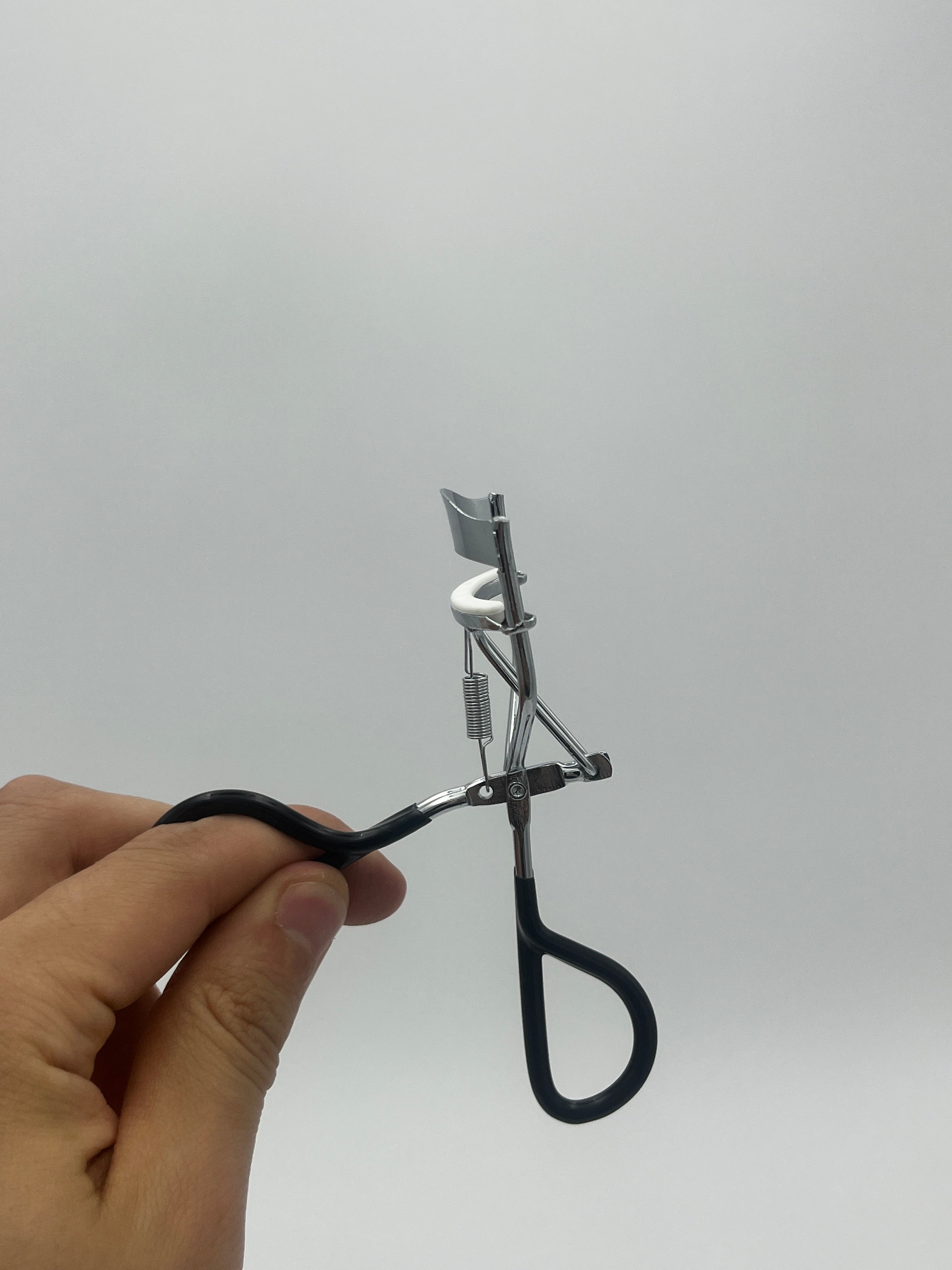 Rizador Metálico Negro Con Resorte - Paquete de 10 piezas 8.40 c/u