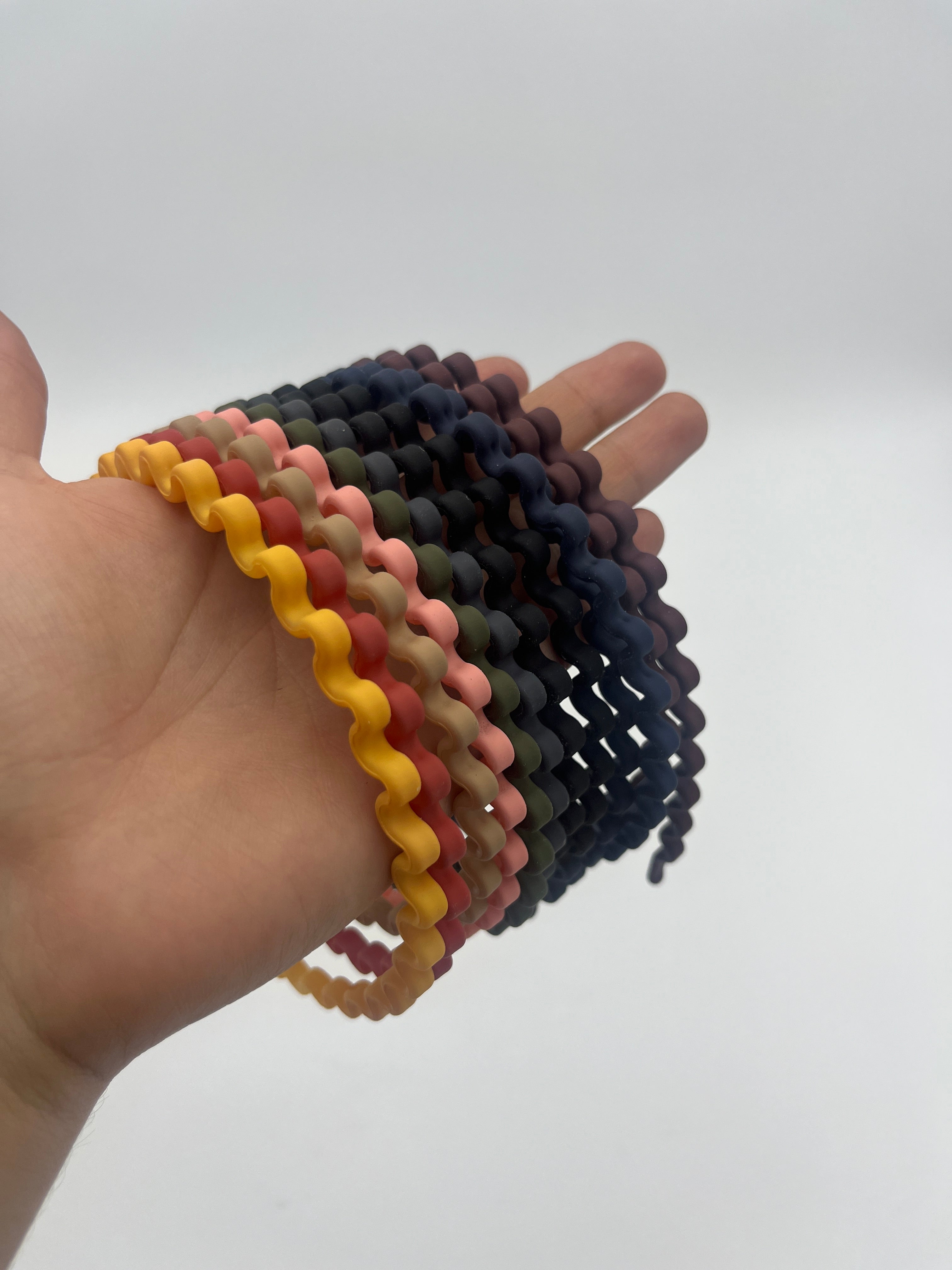 Diadema Ondas Colores Surtidos - Paquete de 12 piezas 1.83 c/u