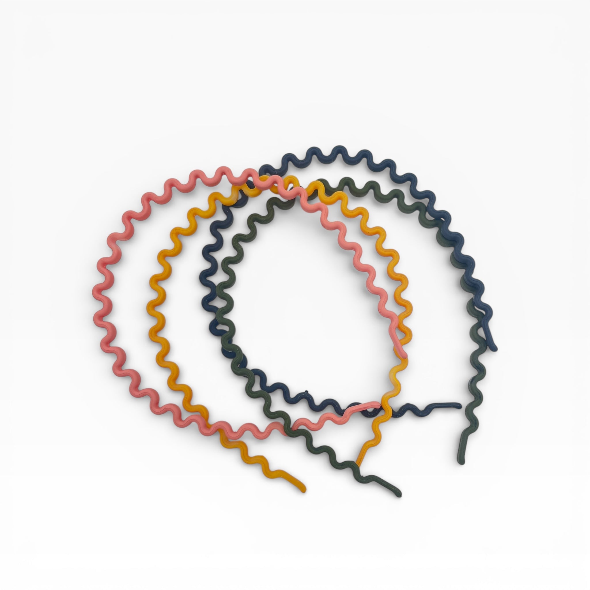 Diadema Ondas Colores Surtidos - Paquete de 12 piezas 1.83 c/u