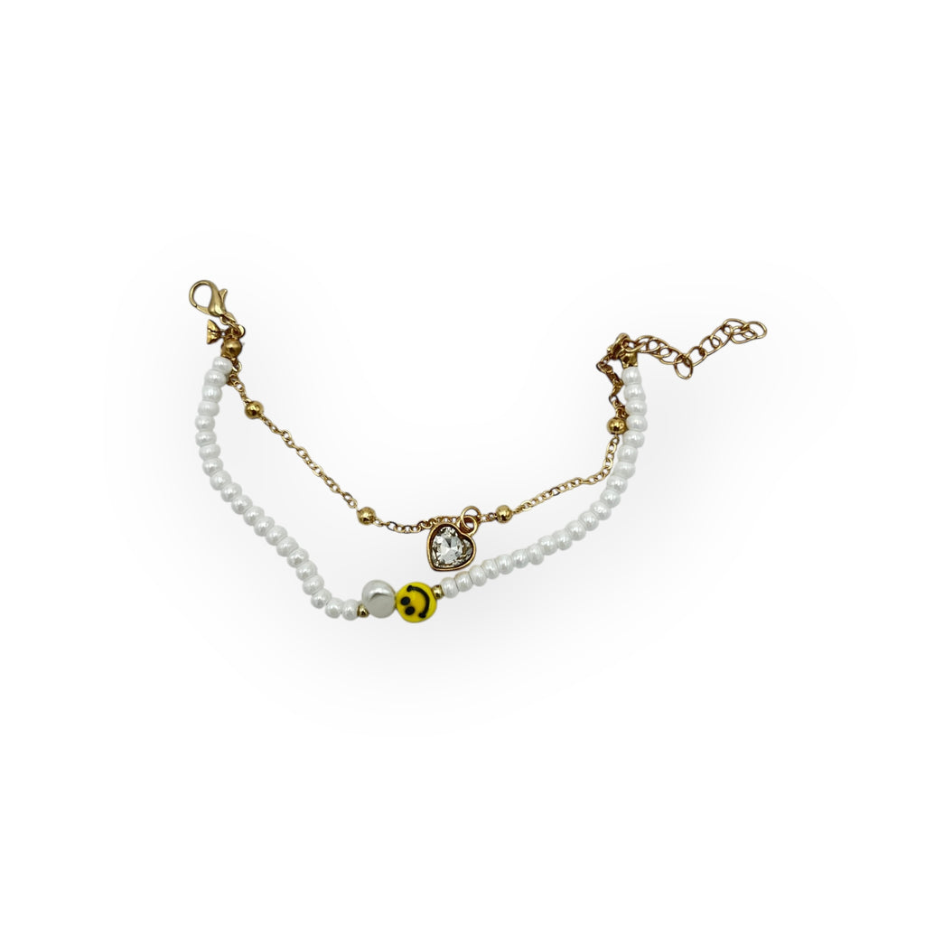 Pulsera Doble Capa con Cuentas Blanca y Carita Feliz - Paquete de 12 piezas 14.08 c/u