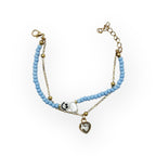 Pulsera Doble Capa con Cuentas y Carita Feliz Azul - Paquete de 12 piezas 14.08 c/u